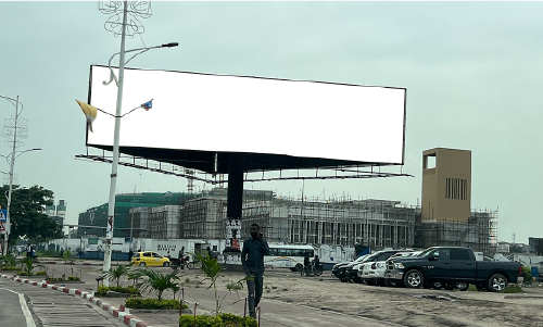 Large blank billboard in an urban area, symbolizing restrictions on tobacco advertising